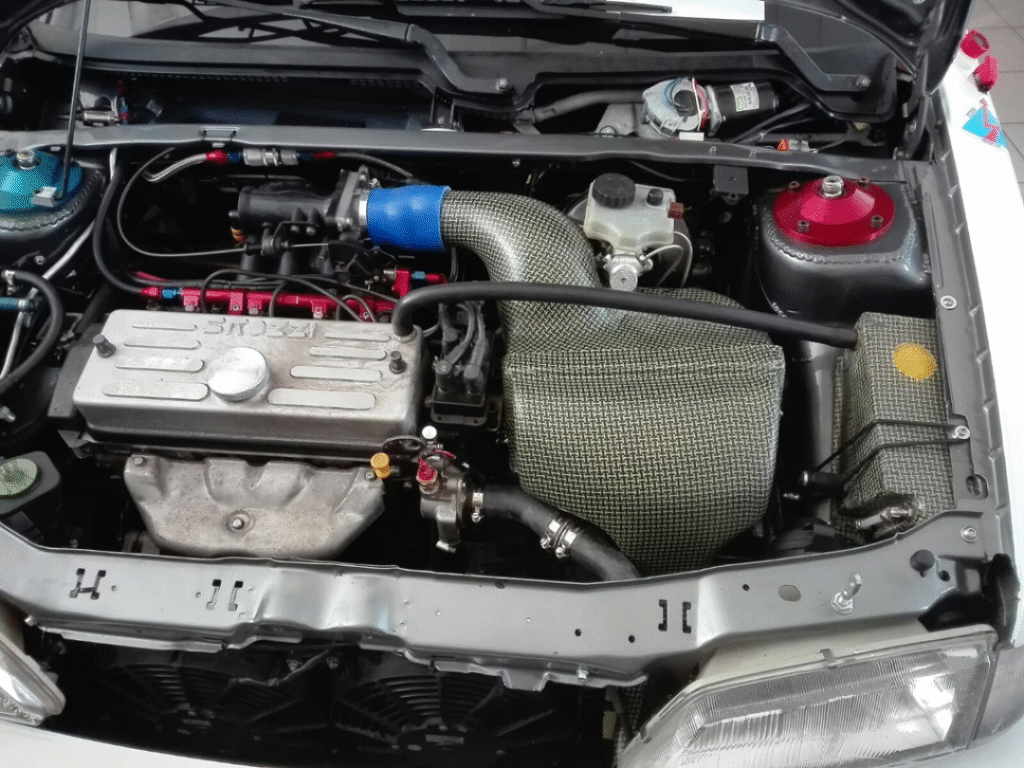 E556CK - Gruppo Aspirazione Peugeot 106